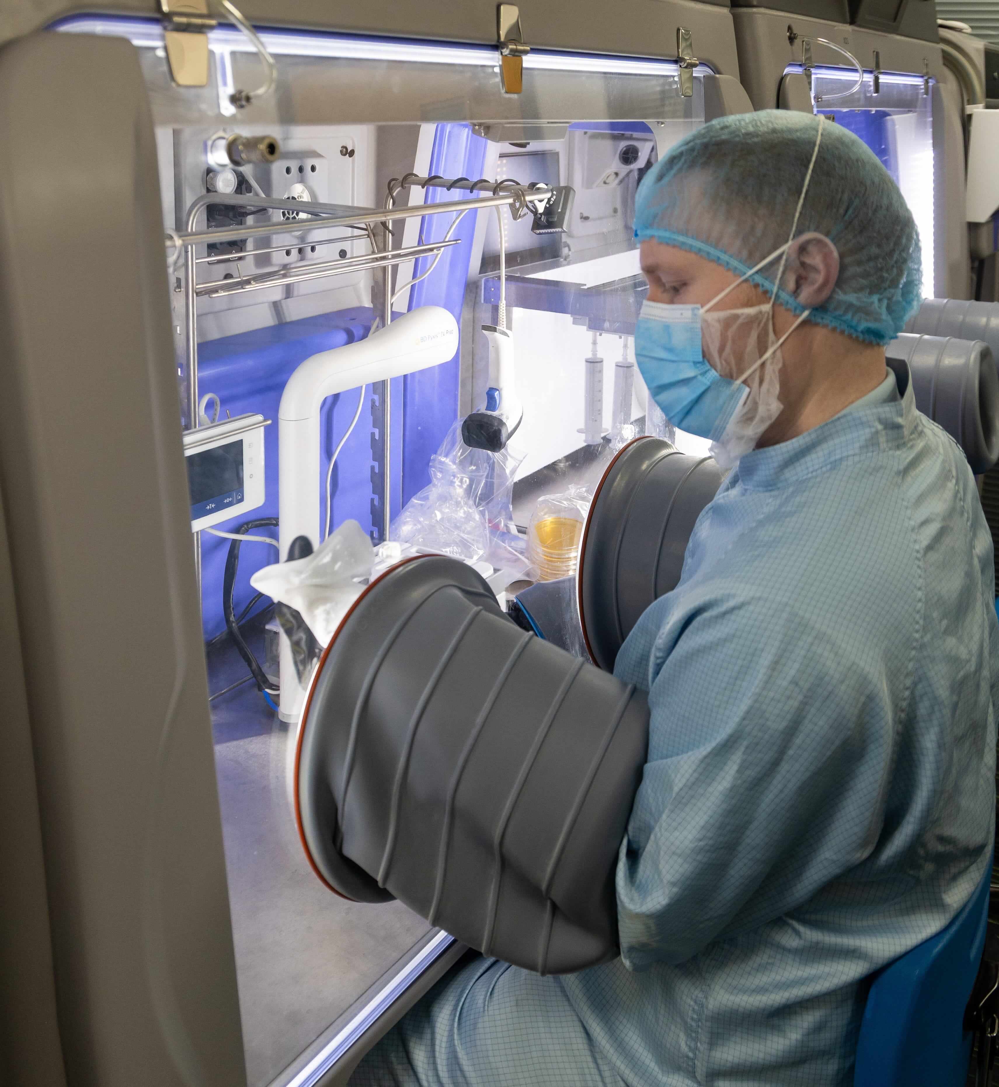 Compounding Technician at work in aseptic services