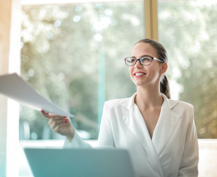 Quality Assurance Officer reviewing documentation